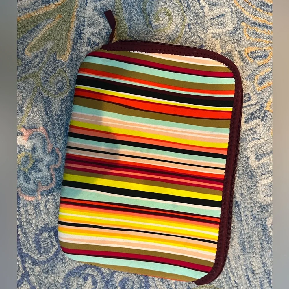 Colorful striped I pad sleeve. About 8inx10in. Machine washable and durable.